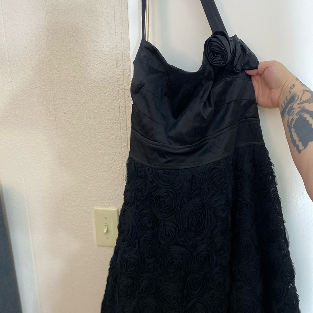 Knee length black cocktail dress. Slight wear on armpits/ only worn twice